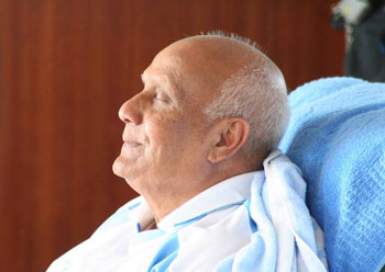Sri Chinmoy meditating